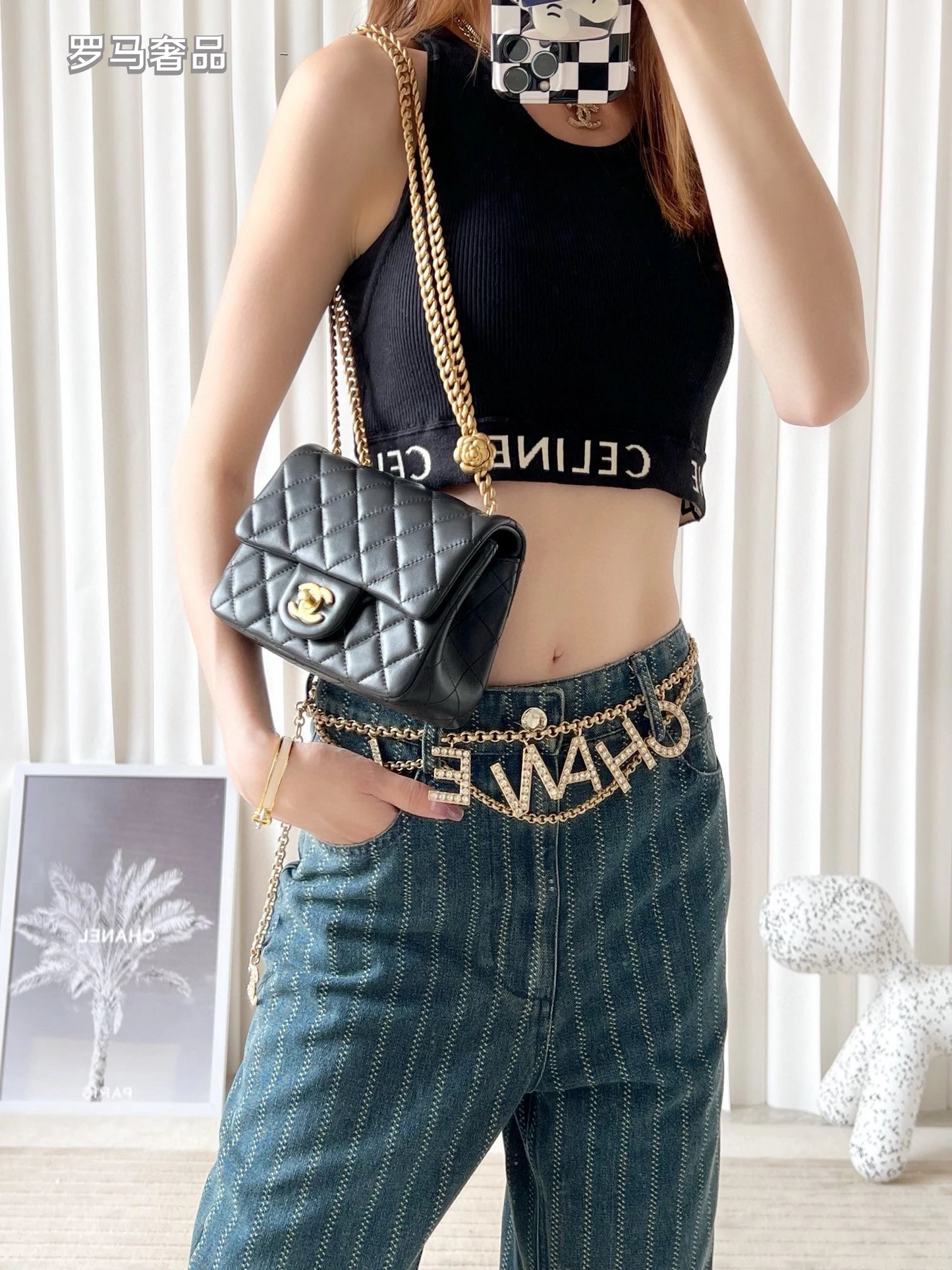 Black Quilted Leather Mini Flap Bag with Gold-Tone Chain and Camellia Charm