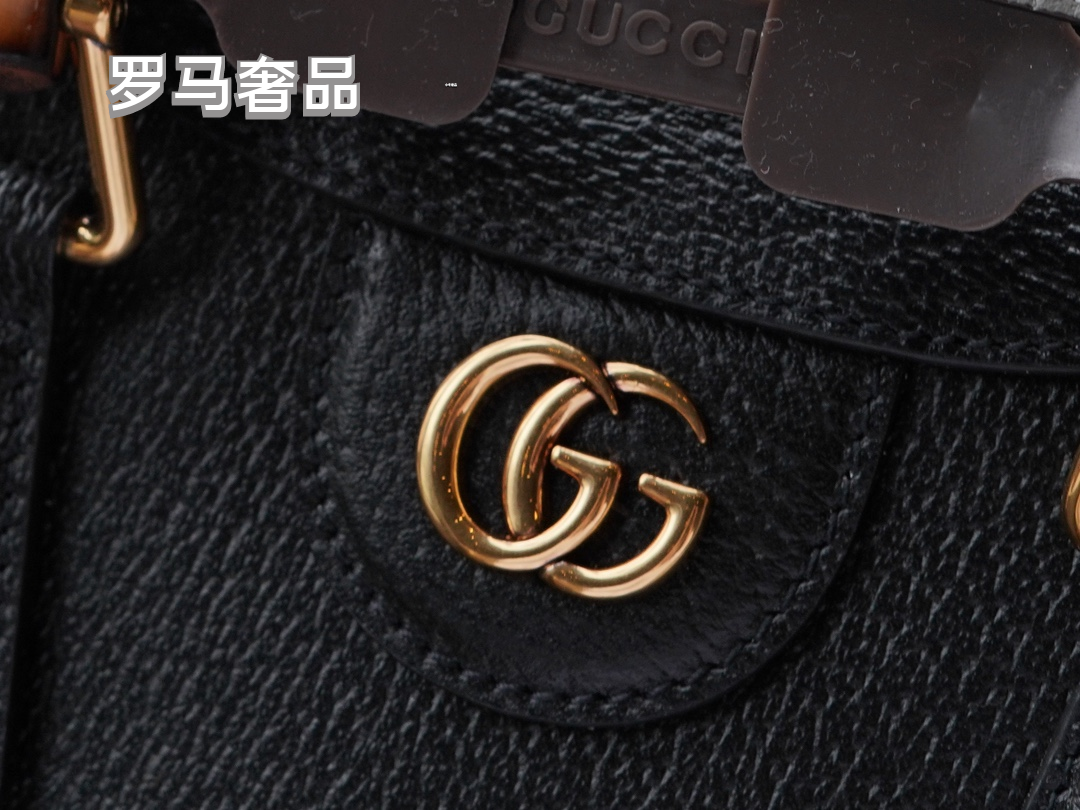 Gucci Elegant Off-White Leather Tote Bag with Bamboo Handles and Web Strap