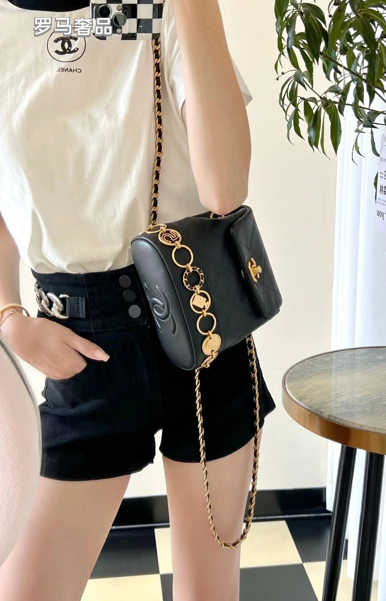 Chanel Vintage Mini Quilted Leather Backpack with Medallion Charm Chain Detail - Black/Gold