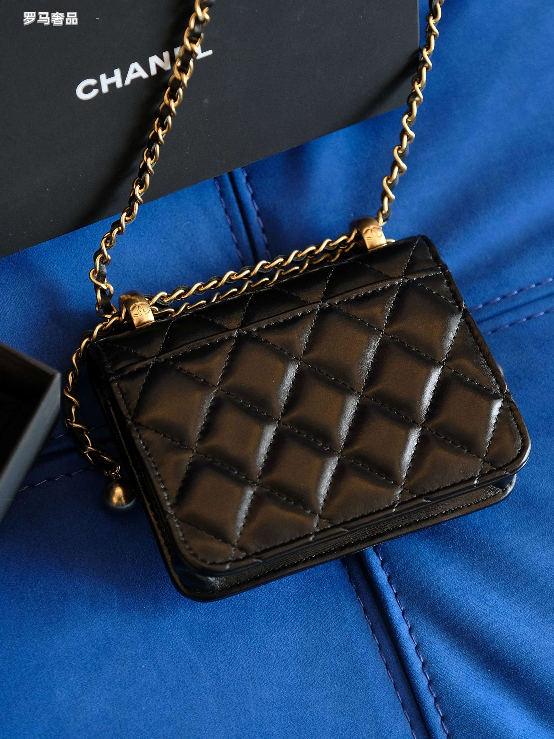 Chanel Mini Flap Bag with Top Handle Black Quilted Leather Gold Hardware