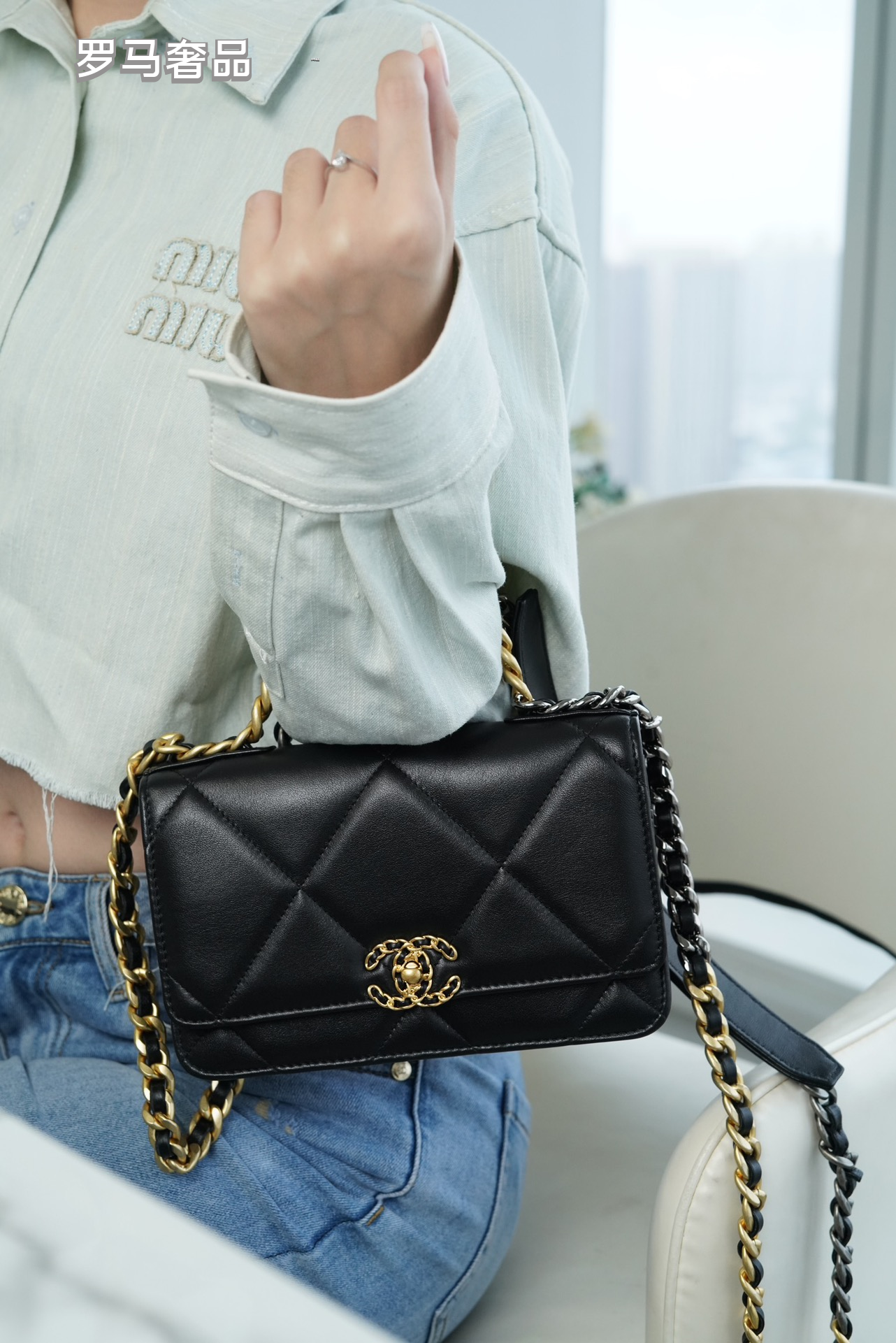 Elegant Black Quilted Leather Shoulder Bag with Gold-Tone Chain Strap