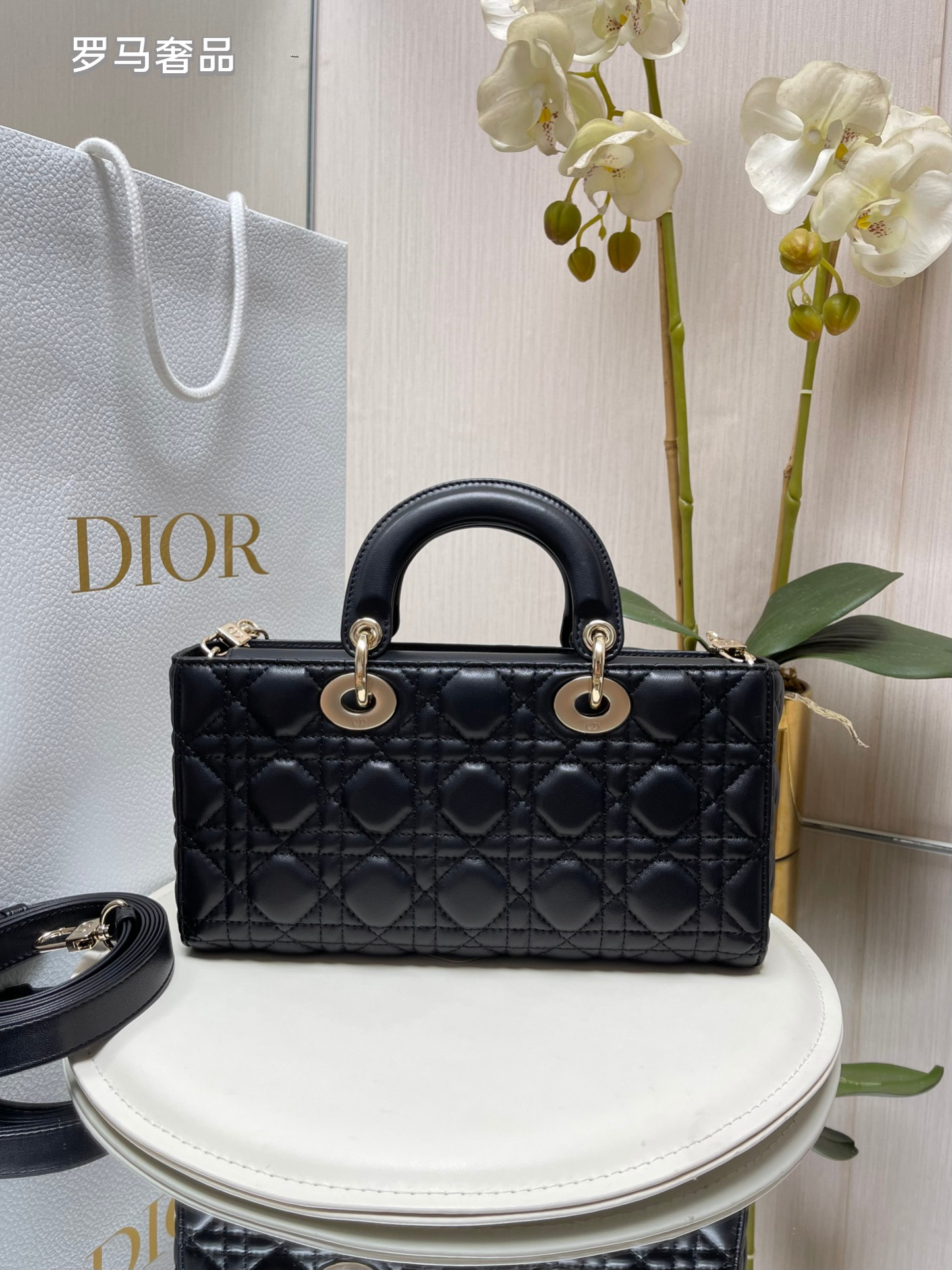 Dior Black Quilted Leather Handbag with Top Handle and Gold Chain Strap