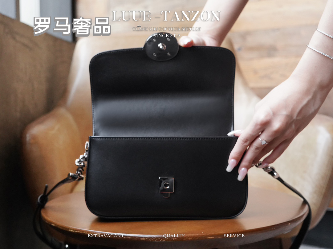 Gucci Classic Black Leather Shoulder Bag with Silver Oval Logo Buckle