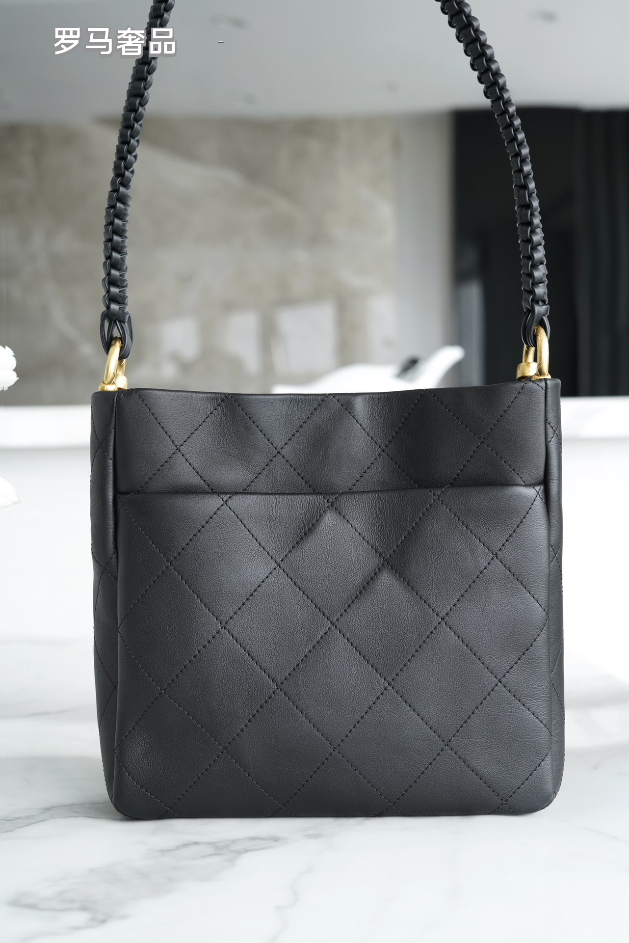Chanel Quilted Caviar Leather Small Bucket Bag with Gold-Tone Hardware - Black