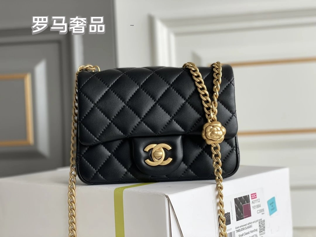 Black Quilted Leather Mini Flap Bag with Gold-Tone Chain and Camellia Charm
