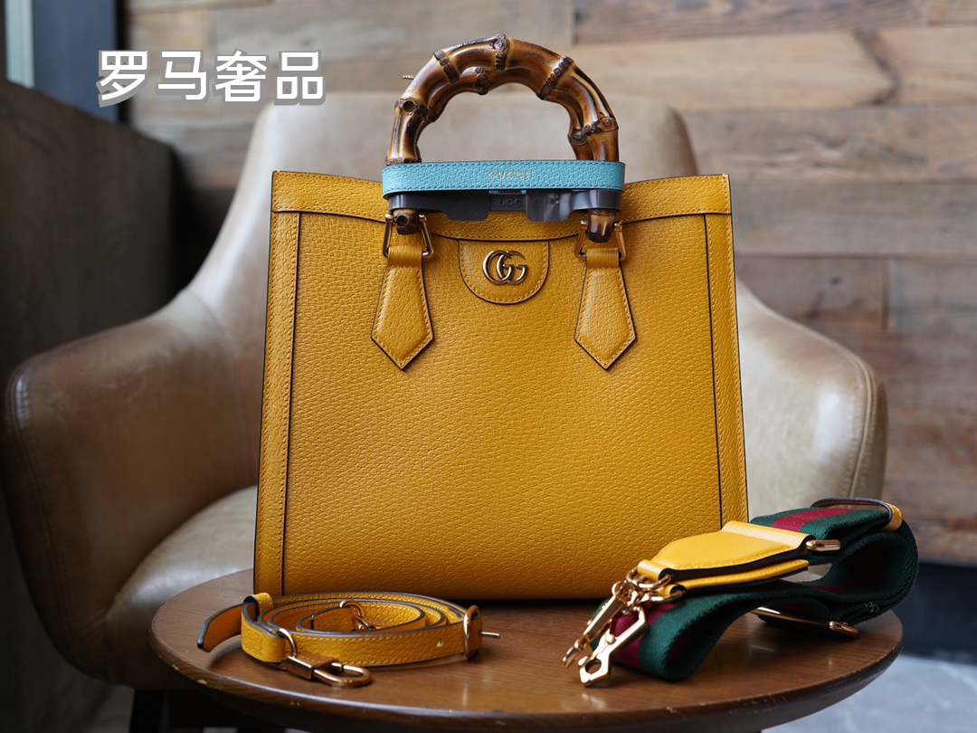 Gucci Elegant Off-White Leather Tote Bag with Bamboo Handles and Web Strap