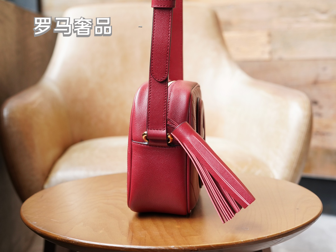 Gucci Red Leather Crossbody Camera Bag with Embossed Logo and Tassel