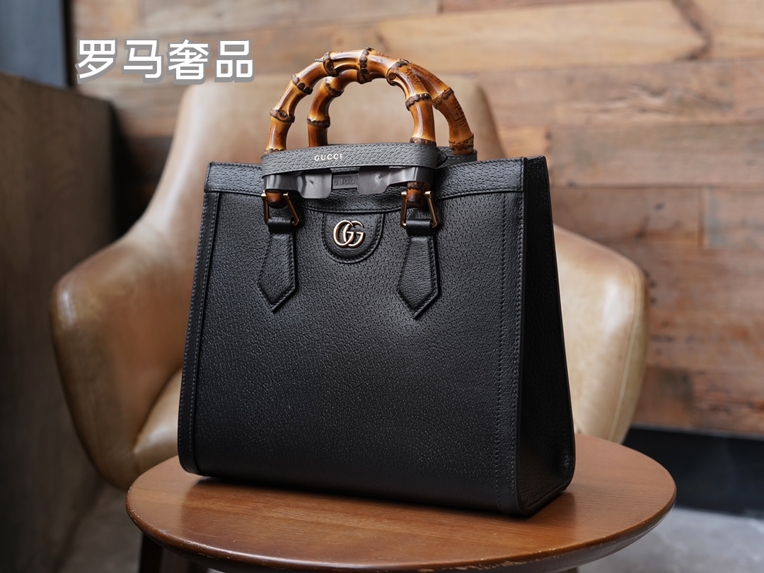 Gucci Elegant Off-White Leather Tote Bag with Bamboo Handles and Web Strap