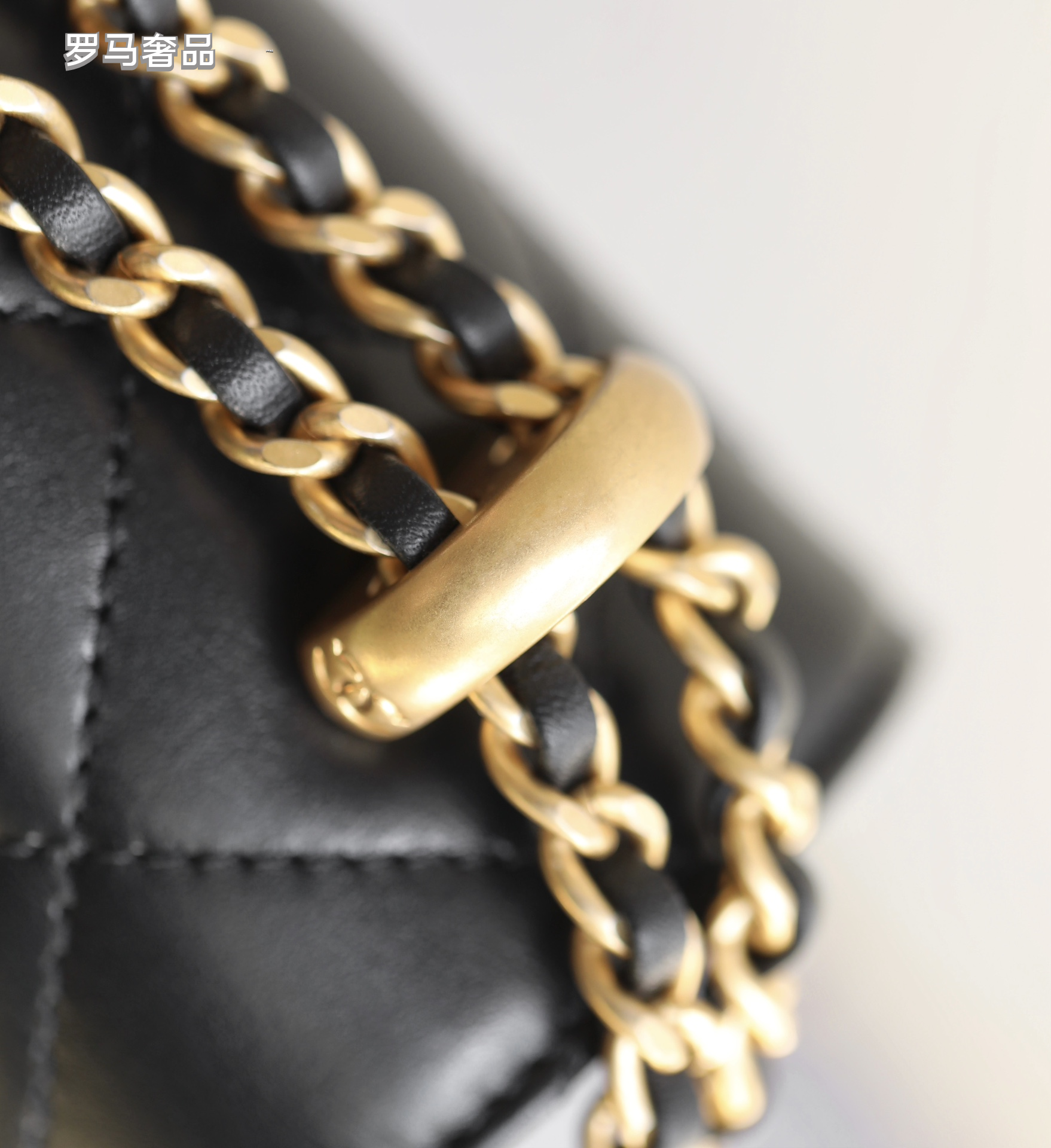 Chanel Black Quilted Lambskin Mini Flap Bag with Gold-Tone Hardware