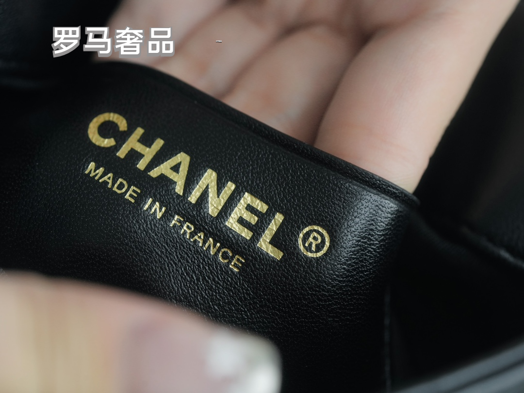 Chanel Black Quilted Leather Flap Bag with Lion Head Chain Embellishments