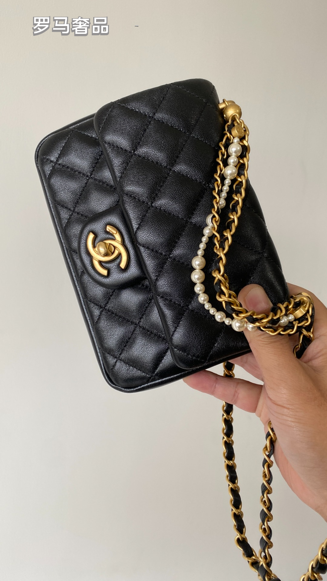 Chanel Quilted Mini Flap Bag with Pearl and Chain Strap, Black Lambskin