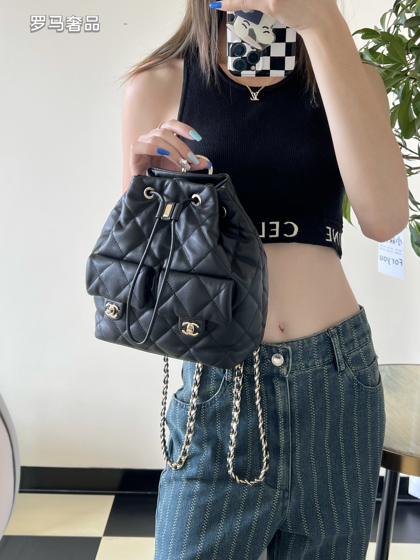 Chanel-Style Quilted Black Leather Bucket Bag with Silver Chain Strap