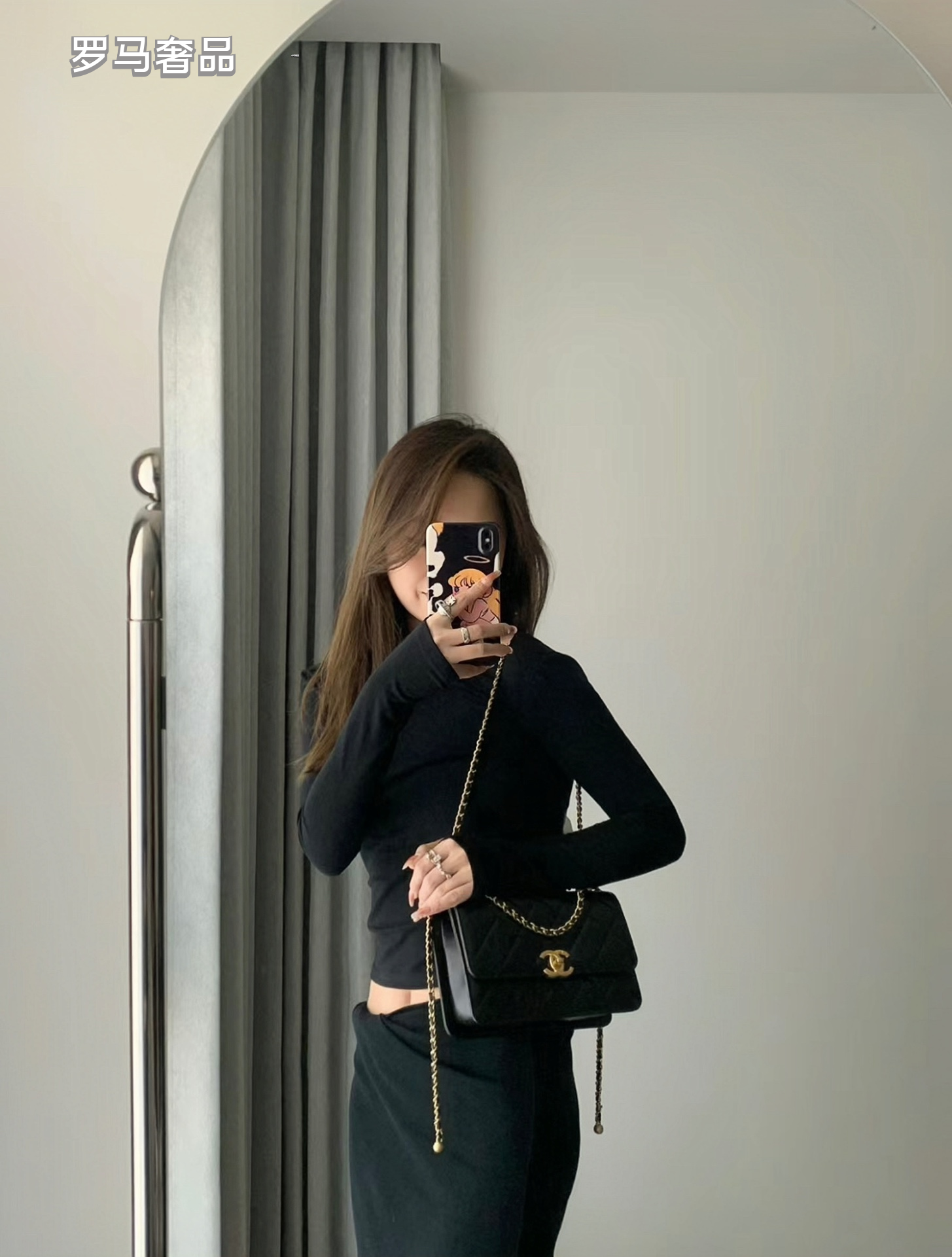 Chanel Black Quilted Lambskin Mini Flap Bag with Gold-Tone Hardware