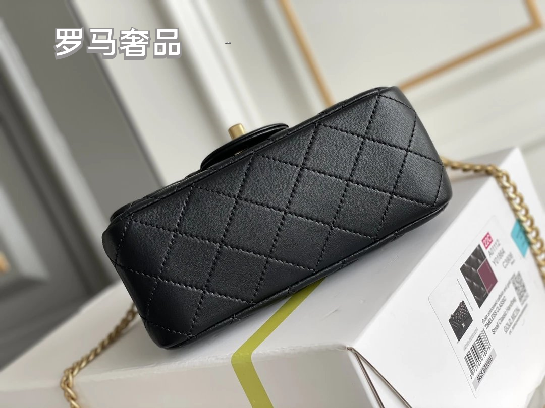 Black Quilted Leather Mini Flap Bag with Gold-Tone Chain and Camellia Charm
