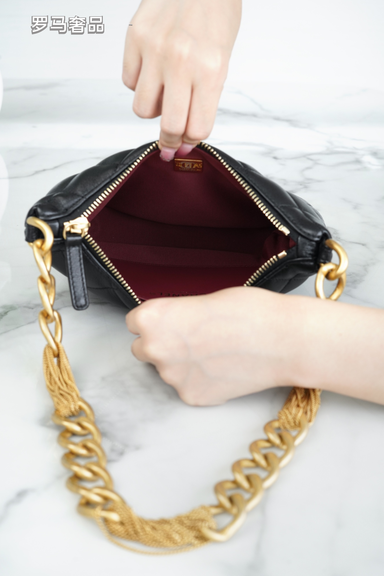 Chanel Quilted Black Leather Hobo Bag with Gold-Tone Chain Strap