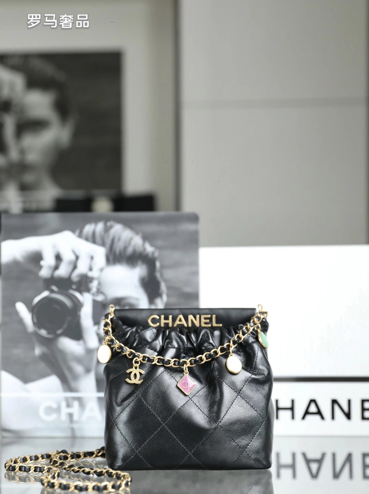 Chanel 22 Small Handbag Black Quilted Leather Gold-Tone Charms