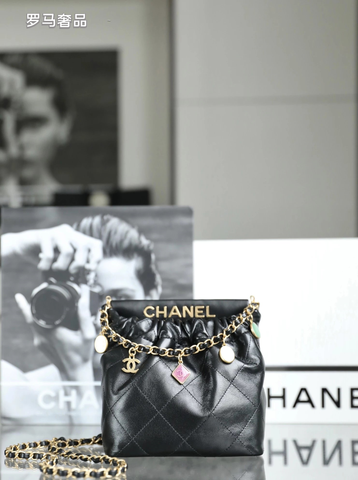 Chanel 22 Small Handbag Black Quilted Leather Gold-Tone Charms