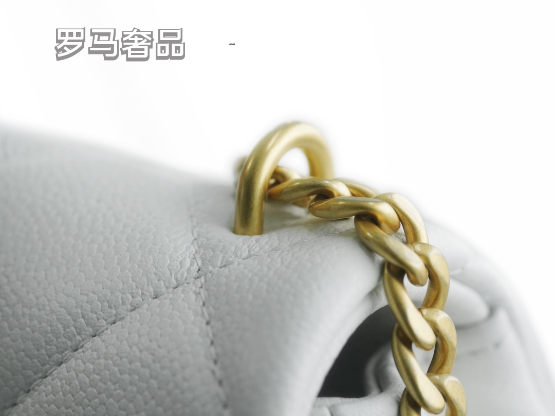 Chanel Quilted Leather Mini Flap Bag with Gold Heart Charm Chain - Black