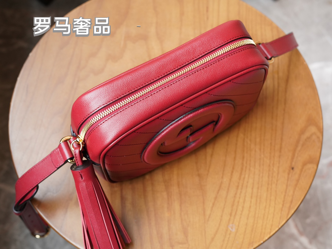 Gucci Red Leather Crossbody Camera Bag with Embossed Logo and Tassel