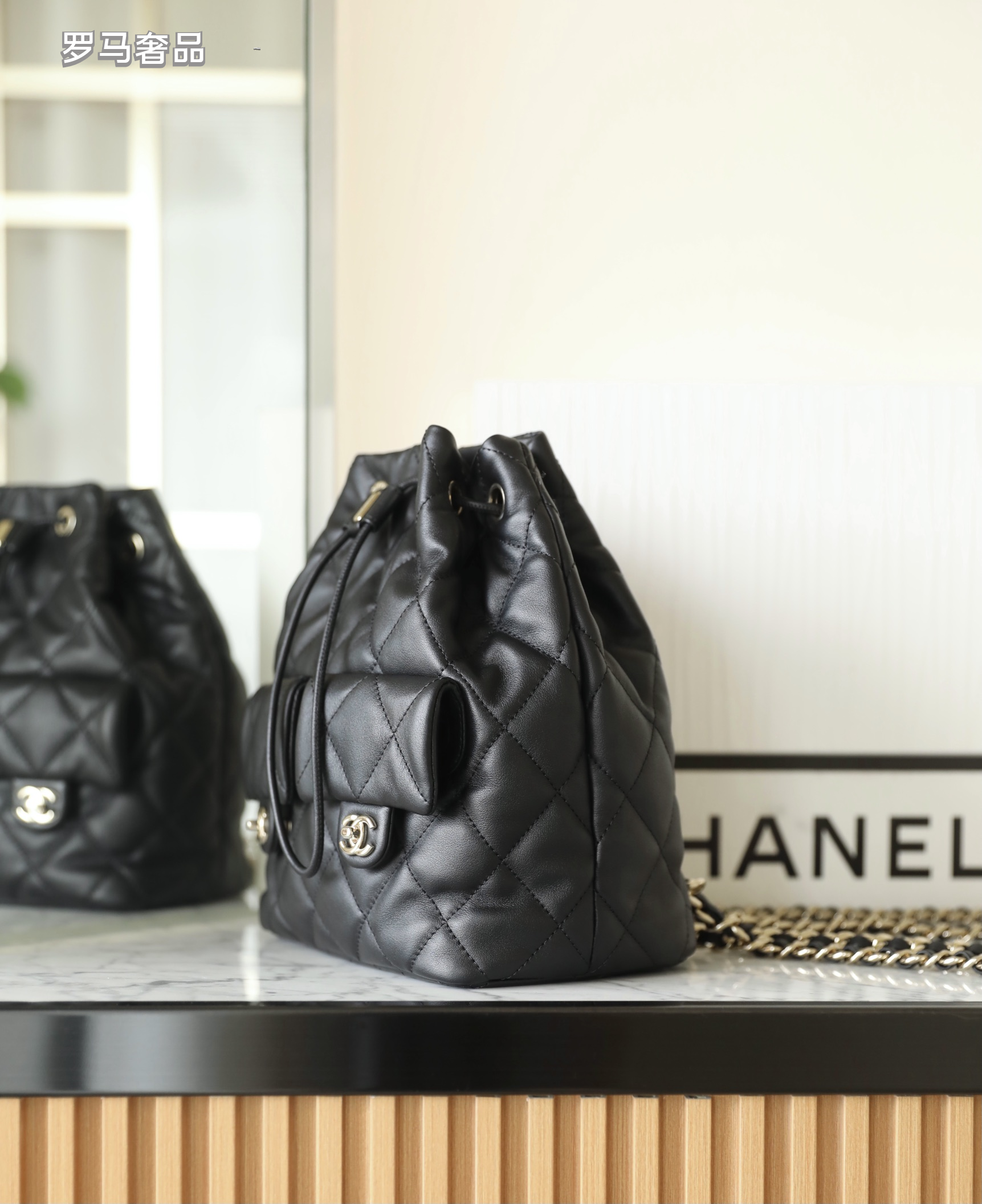 Chanel-Style Quilted Black Leather Bucket Bag with Silver Chain Strap