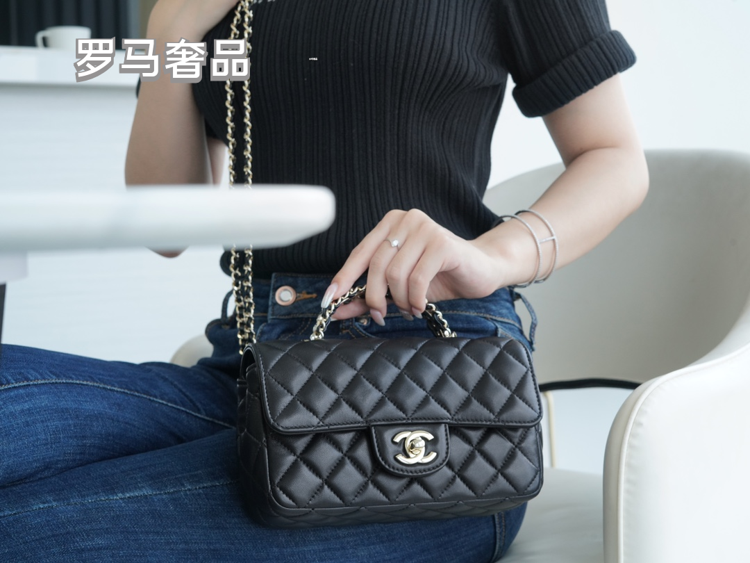 Elegant Black Quilted Leather Top Handle Flap Bag with Silver-Tone Chain