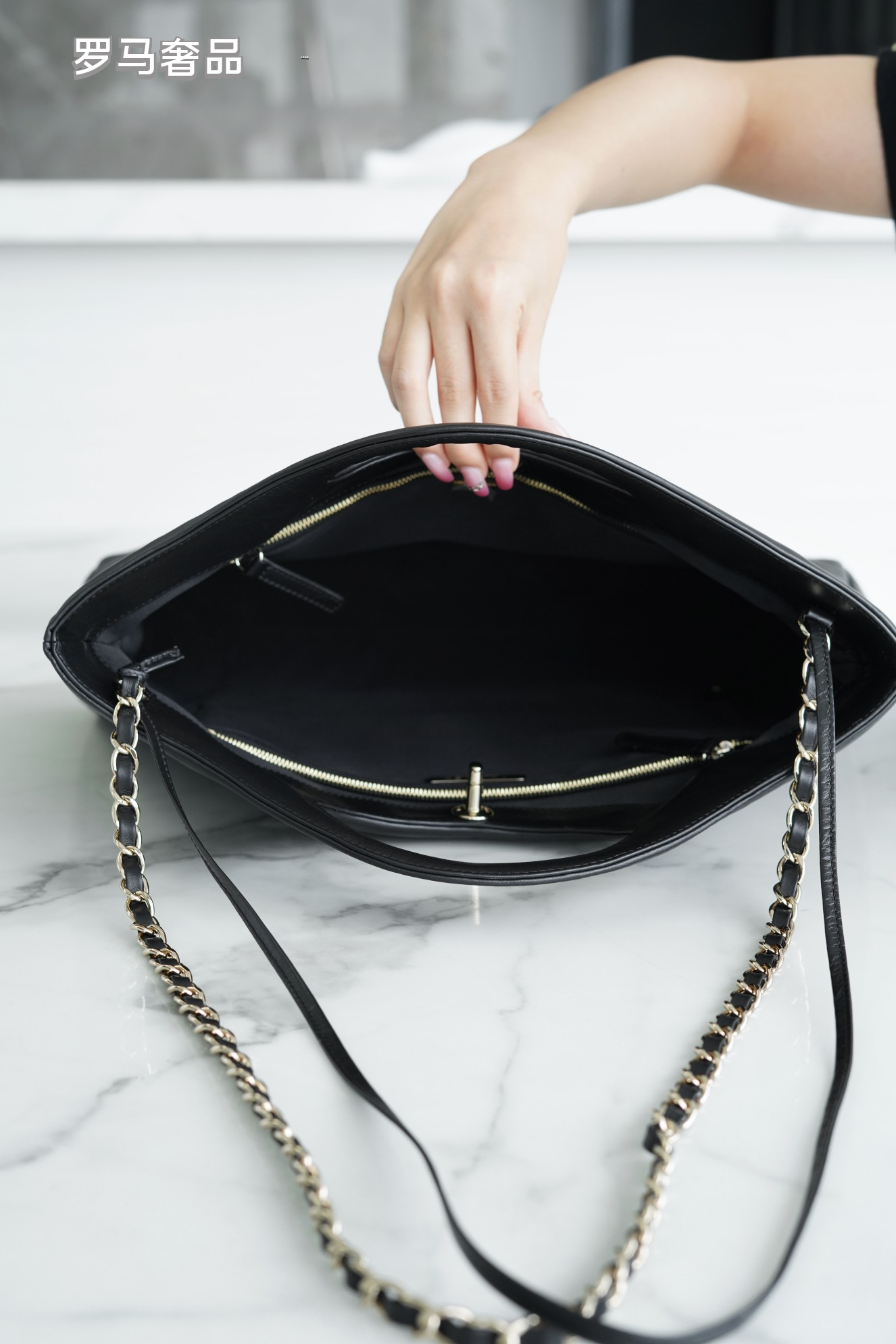 Luxury Black Quilted Leather Handbag with Gold-Tone Chain Strap and Cut-Out Handles