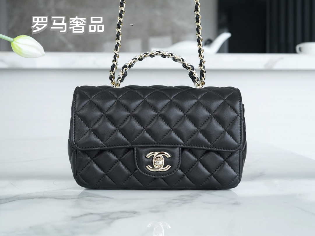 Elegant Black Quilted Leather Top Handle Flap Bag with Silver-Tone Chain