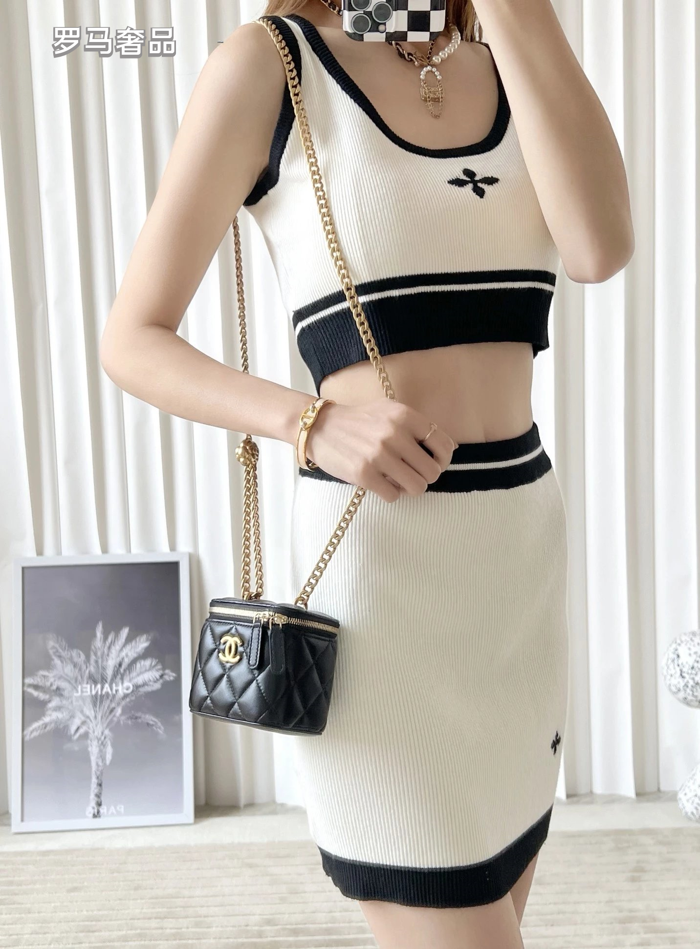 Chanel Black Quilted Leather Mini Vanity Case Crossbody Bag with Gold Camellia Charm