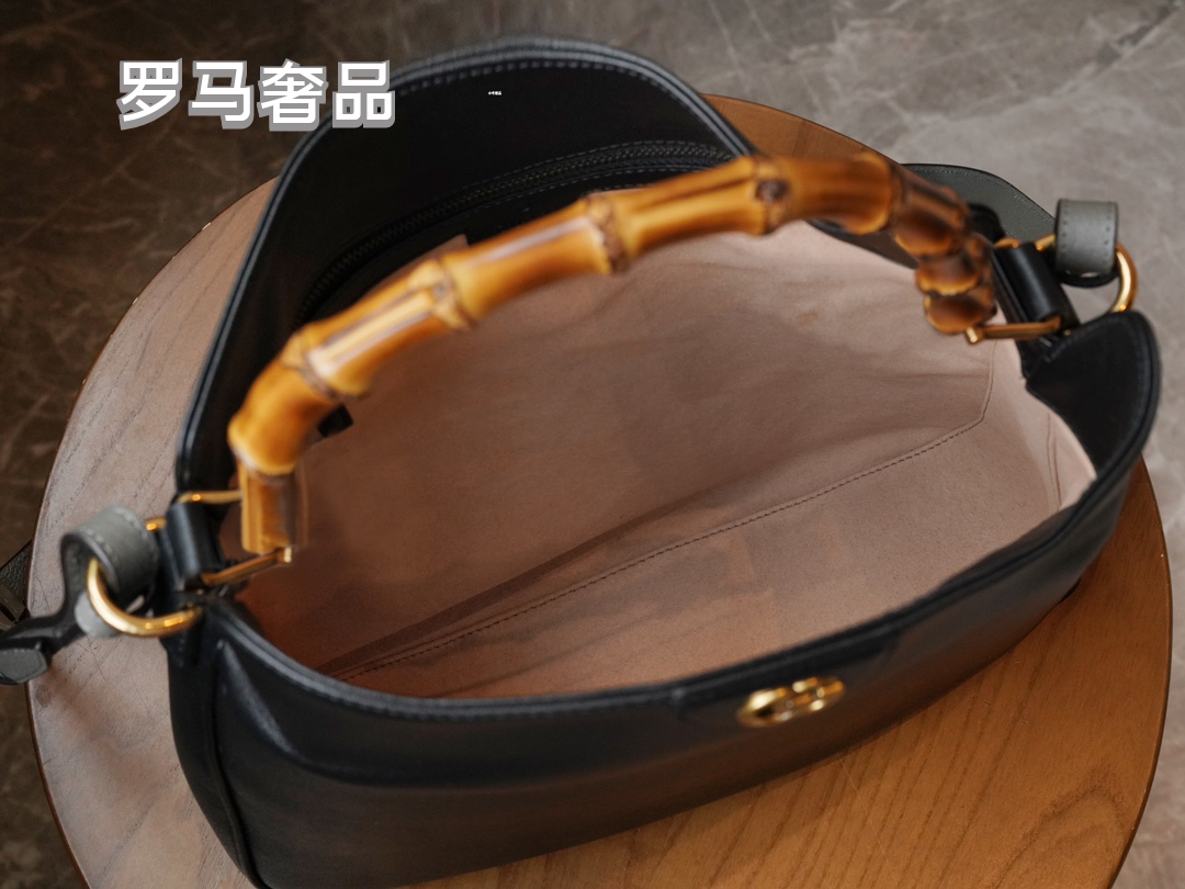 Gucci Vintage Black Leather Handbag with Bamboo Handle and Shoulder Strap