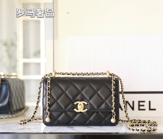 Chanel Black Quilted Lambskin Mini Flap Bag with Gold-Tone Hardware