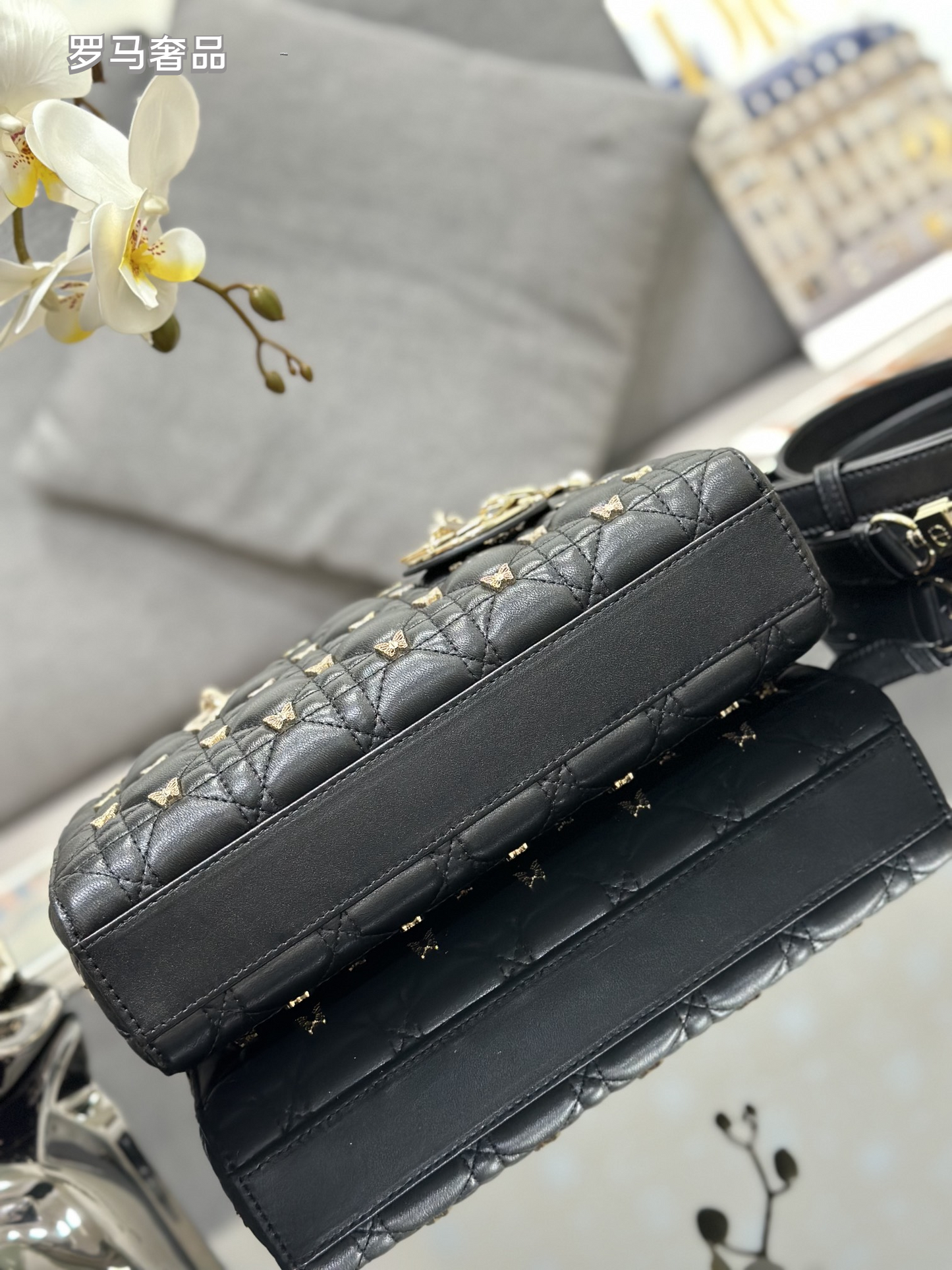Dior Luxury Black Quilted Leather Top Handle Bag with Gold Butterfly Charm