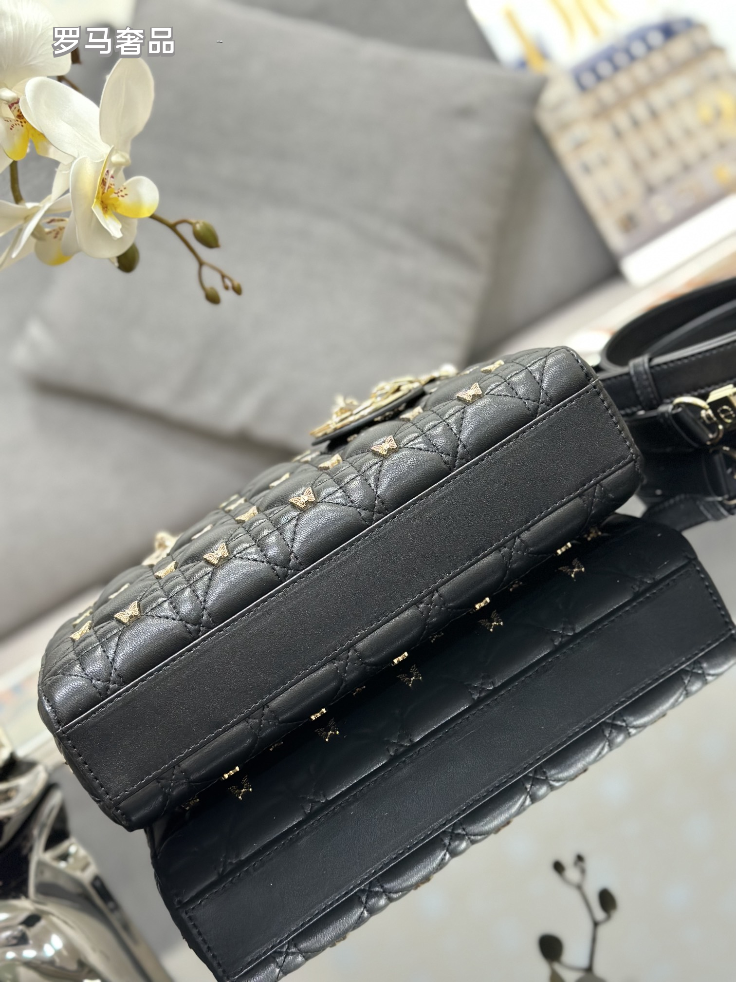 Dior Luxury Black Quilted Leather Top Handle Bag with Gold Butterfly Charm