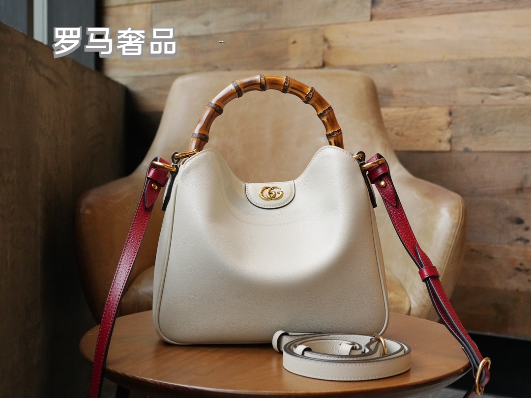Gucci Vintage Black Leather Handbag with Bamboo Handle and Shoulder Strap