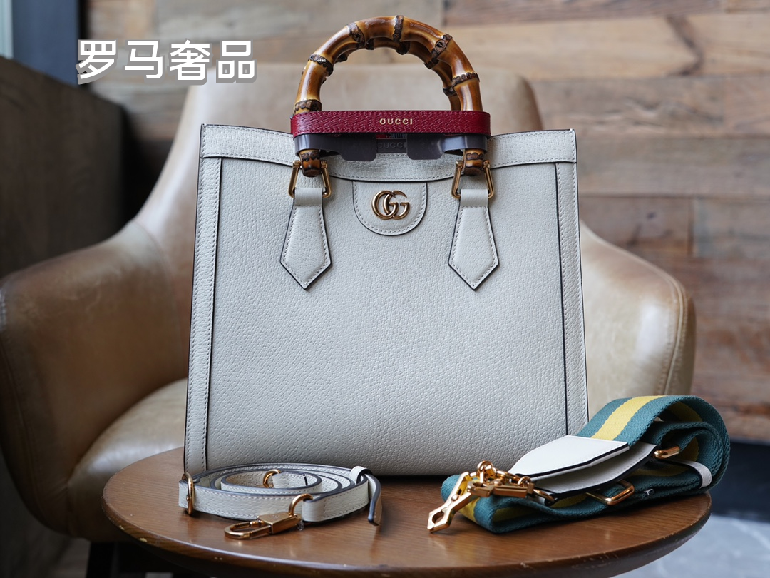 Gucci Elegant Off-White Leather Tote Bag with Bamboo Handles and Web Strap